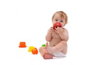 Cute Infant Boy With Apple